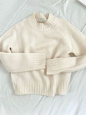 Vince cable-knit wool-blend sweater in a creamy white.
